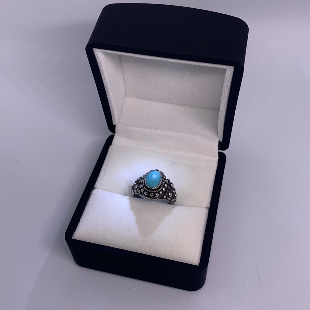 Turquoise ring sz 5 3/4 . Stamped 925
